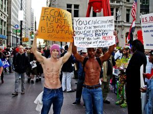 1446px-Day_40_Occupy_Wall_Street_October_25_2011_Shankbone_7-300x224.jpeg