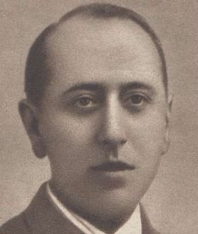 Retrato en sepia de José María Gil-Robles, de frente, con traje oscuro y corbata, hacia 1933